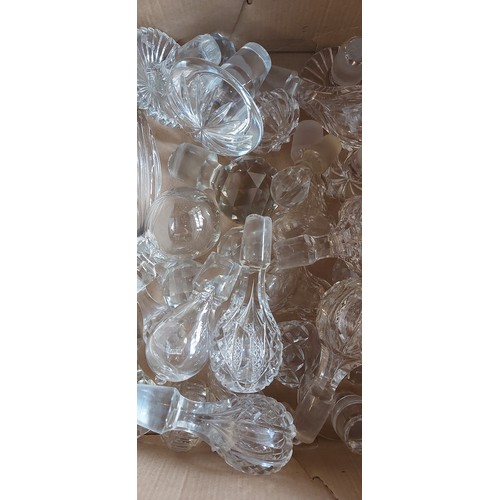 59 - A pair of cut glass decanters together with other decnters, jugs and decanter stoppers