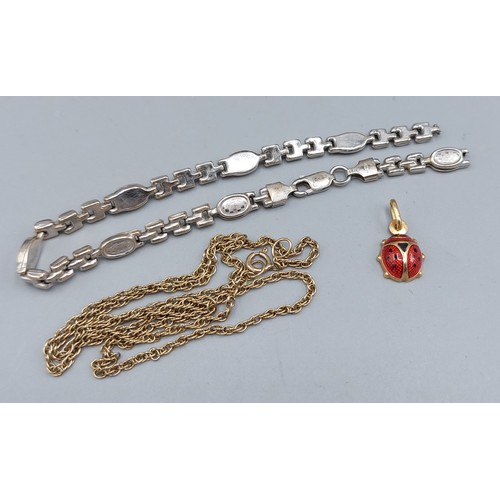 69 - A 9ct gold bracelet, a 9ct gold linked chain and a 9ct gold pendant, 8.2gms