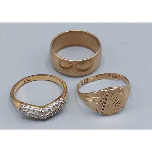 71 - A 9ct gold wedding band together with a 9ct gold Signet ring, 9.9gms together with a dress ring