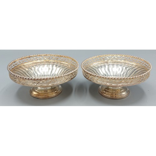 72 - A pair of Birmingham silver circular pedestal bon bon dishes with pierced decoration by Mappin & Web... 
