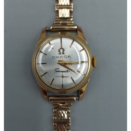 78 - An Omega Seamaster ladies wristwatch with 9ct gold strap, 8.8gms strap only