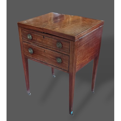 236 - A Regency mahogany dressing table, the double hinged top enclosing a fitted interior with mirror, gl... 
