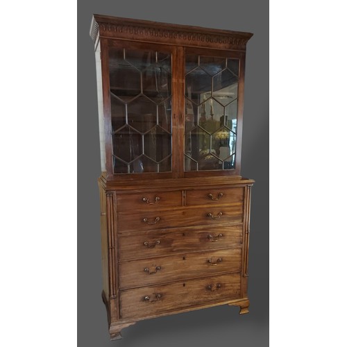 234 - A Regency mahogany Secretaire bookcase, the moulded cornice above two astragal glazed doors, the low... 