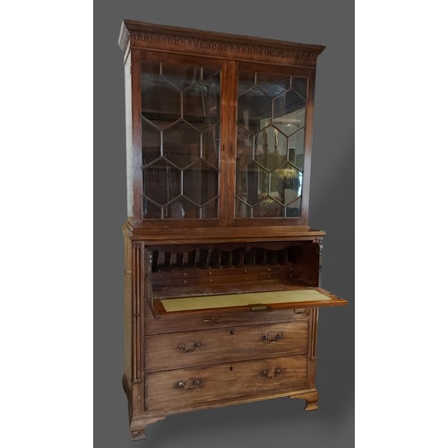 234 - A Regency mahogany Secretaire bookcase, the moulded cornice above two astragal glazed doors, the low... 