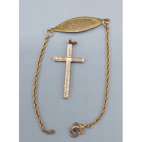 83 - A 9ct gold bracelet together with a 9ct gold crucifix pendant, 5.1gms