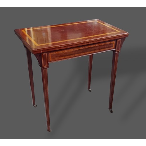 240 - An Edwardian mahogany satinwood inlaid card table, the hinged top enclosing a baize lined interior r... 