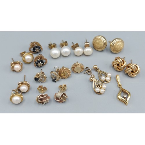 97 - A collection of eleven pairs of 9ct gold ear studs, together with a 9ct gold pendant, 5gms