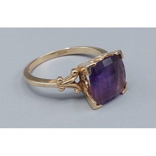 103 - A 14ct gold ring set with a square Amethyst, 3.7gms, ring size N