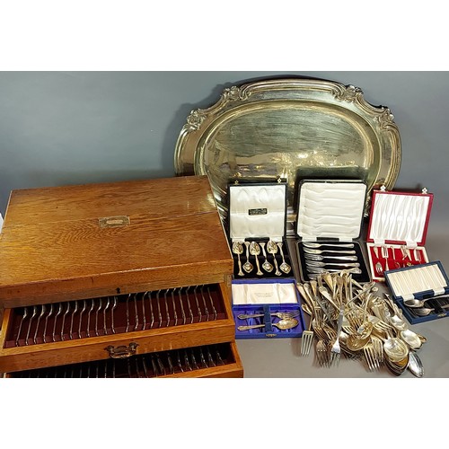 111 - An oak cased canteen of silver plated flatware together with a silver plated oval meat platter and a... 