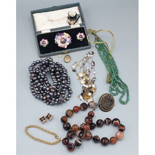 114 - A gold plated bracelet by Christian Dior together with a collection of jewellery to include bead nec... 