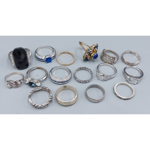 116 - A silver dress ring together with a collection of dress rings