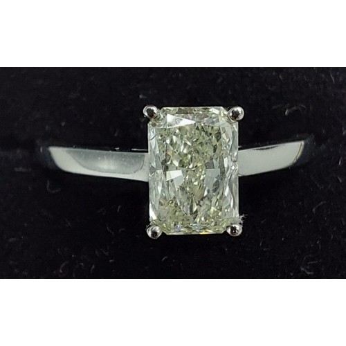 118 - A Platinum solitaire Dimond ring set with baguette cut Diamond, approx 1ct, ring size L, 3.2gms