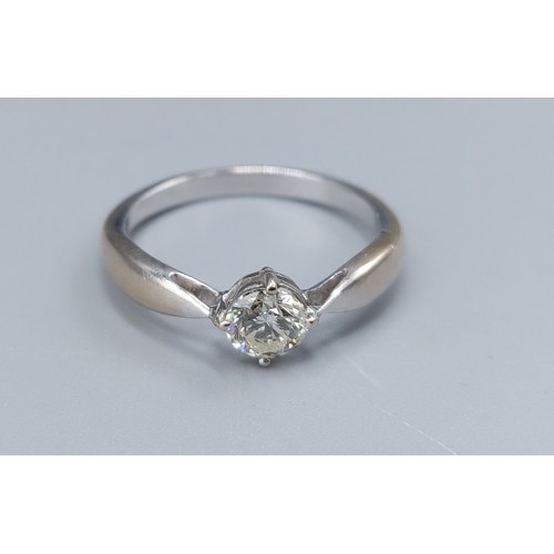 122 - An 18ct solitaire diamond ring, ring size M, 2.8gms