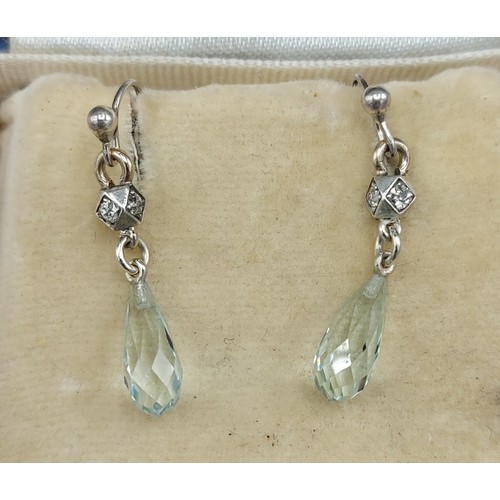 127 - A pair of Aquamarine and Diamond set drops earrings
