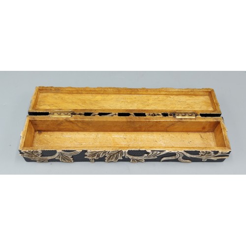 198 - A Chinese carved hard stone box, the hinged cover decorated in relief with a foliate design, 20cms l... 