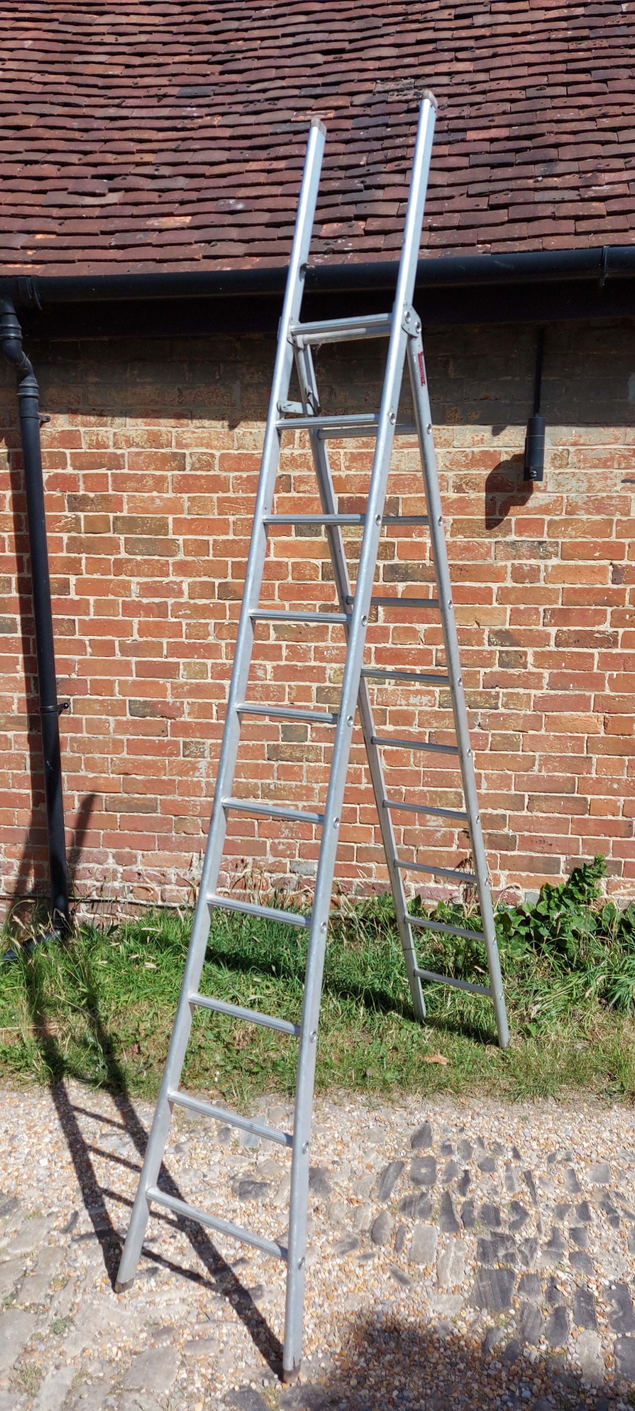 A large Gravity Ladders aluminium folding step ladder