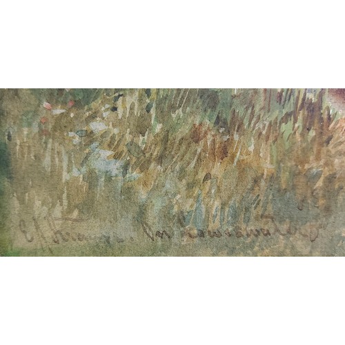 59 - A 19th Century watercolour, highland lake scene with figure in a boat, 35cms x 53cms