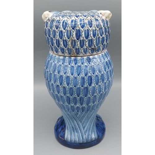 33 - A Delft blue and white armorial tobacco jar in the form of an owl with Boch mark to base and numbere... 