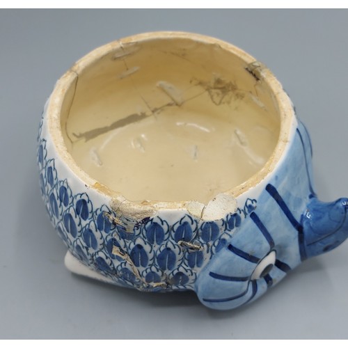 33 - A Delft blue and white armorial tobacco jar in the form of an owl with Boch mark to base and numbere... 