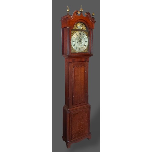 A 19th Century mahogany and oak longcase clock, the arched hood with ...