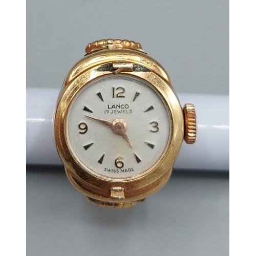 75 - A gold plated ring watch by Lanco