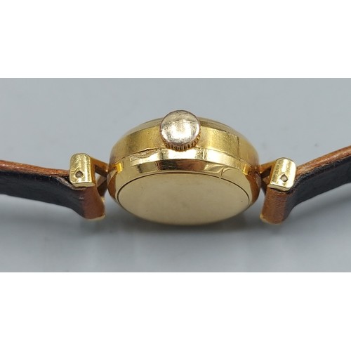 78 - An 18ct gold cased automatic ladies wristwatch by Bucherer