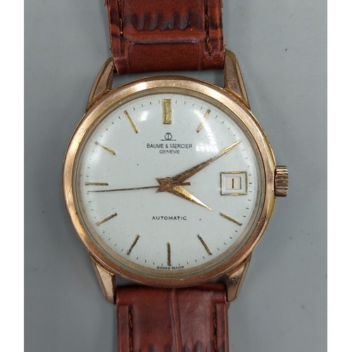 79 - A gold plated gentlemans wristwatch by Baume and Mercier with leather strap