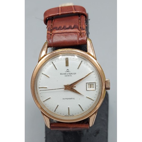 79 - A gold plated gentlemans wristwatch by Baume and Mercier with leather strap