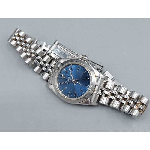 83 - A Rolex Oyster Perpetual, 76080 stainless steel cased ladies wristwatch with blue dial, automatic mo... 
