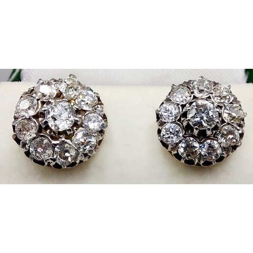85 - A pair of gold Diamond cluster ear studs, each set with a central Diamond surrounded by Diamonds, cl... 