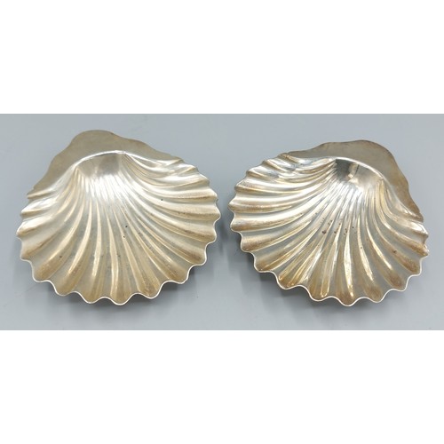 91 - A pair of Victorian silver butter dishes of Scallop form, London 1886, maker Francis Higgins III, 5o... 