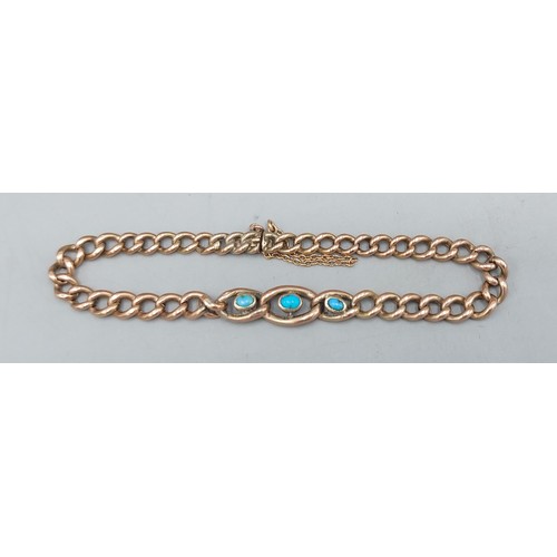 96 - A 9ct gold curb link bracelet set with three Turquoise, 6.1gms