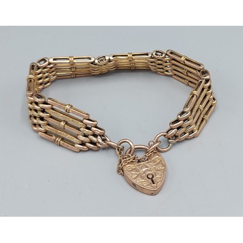 97 - A 9ct gold gate link bracelet with padlock clasp, 19.1gms