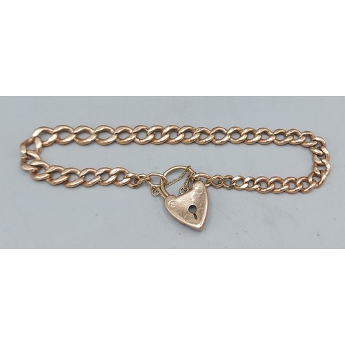 98 - A 9ct gold curb link bracelet with padlock clasp, 13.5gms