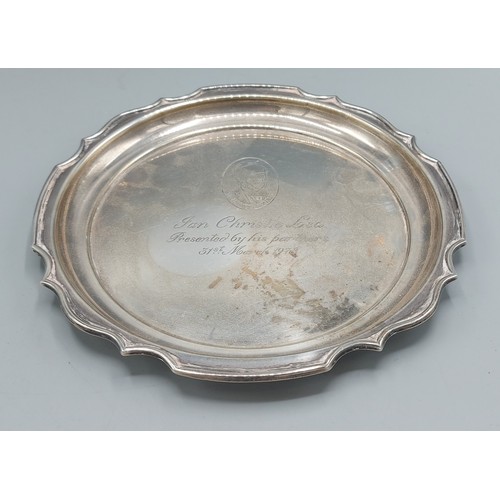 104 - A Queen Elizabeth II silver presentation Waiter of shaped outline, Birmingham 1977, maker Joseph Glo... 