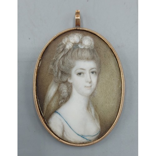109 - An oval portrait miniature within a tested gold frame, 11.2gms excluding portrait, 5cms x 4cms
