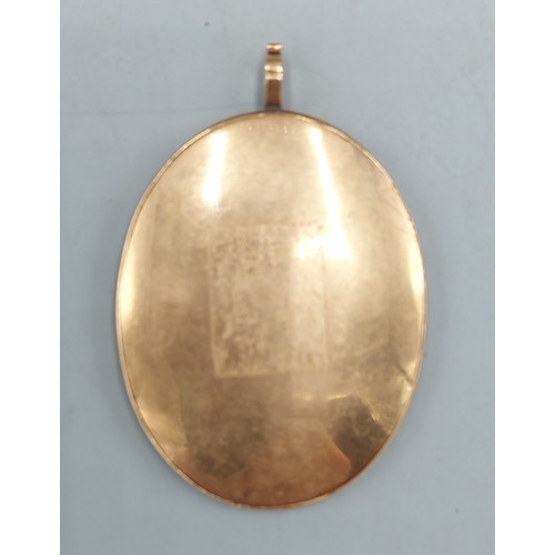 109 - An oval portrait miniature within a tested gold frame, 11.2gms excluding portrait, 5cms x 4cms