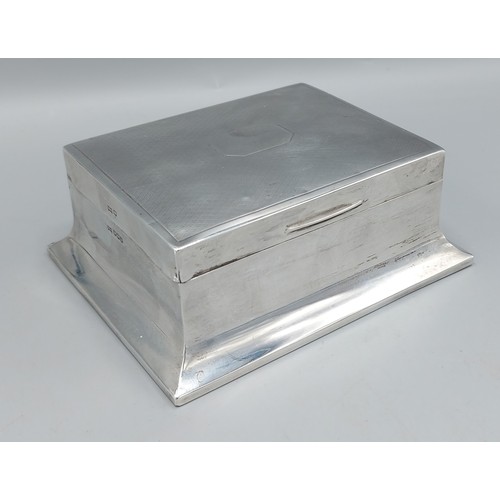 129 - A Sheffield silver cigarette box with engine turned decoration, by Walker and Hall, 13.5cms long