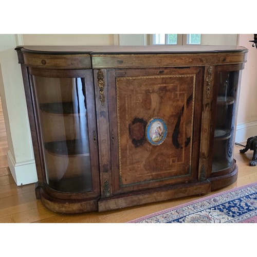 356 - A Victorian walnut gilt metal and porcelain mounted Credenza cabinet, the moulded top above a centra... 