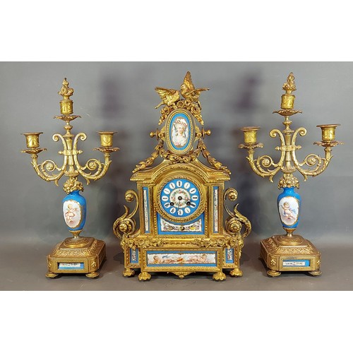 333 - A 19th Century French gilded and porcelain mounted three piece cock Garniture, the clock with painte... 
