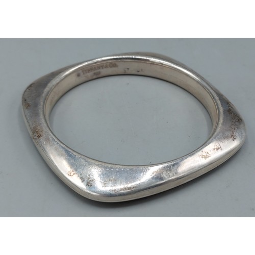 132 - A 925 silver square cushion bangle by Tiffany, 60.1gms