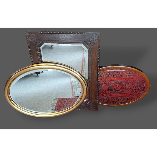 372 - A 19th Century mahogany drop flap dining table together with four mirrors, an oak side chair, a low ... 