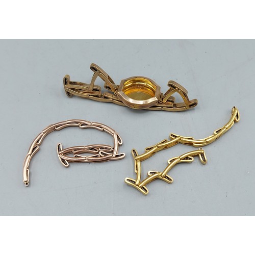 157 - A 9ct gold watch case with strap together with two other 9ct gold watch straps, 23.1gms