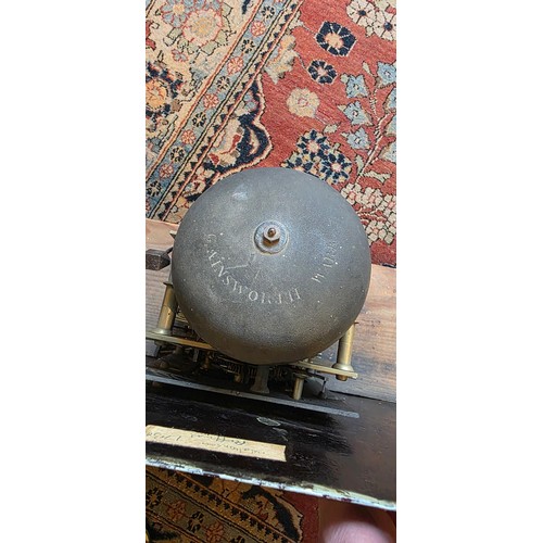 335 - A mahogany longcase clock, the painted dial inscribed Wignall, Ormskirk with two train movement and ... 
