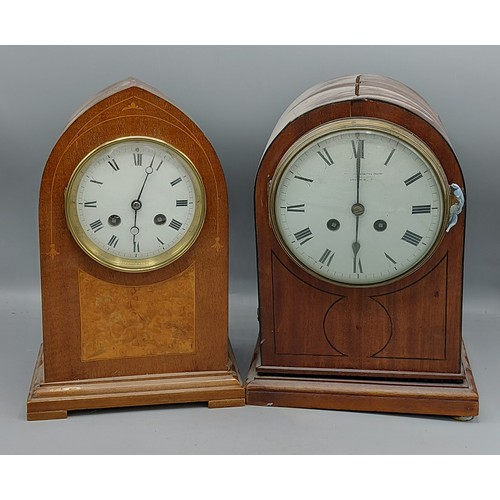 339 - A Edwardian mahogany and burr walnut cased mantle clock with two train movement striking on a gong t... 