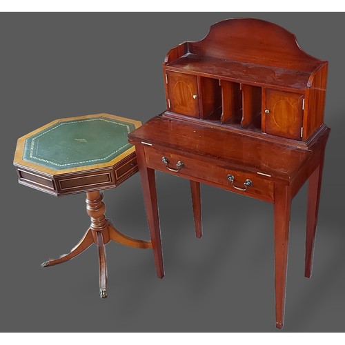 357 - A 20th Century mahogany breakfront bookcase with a moulded cornice above glazed and panel doors rais... 