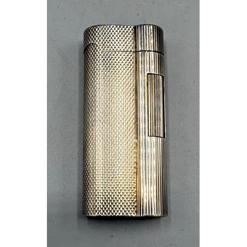 180 - A Dunhill S-Type lighter with engine turned decoration