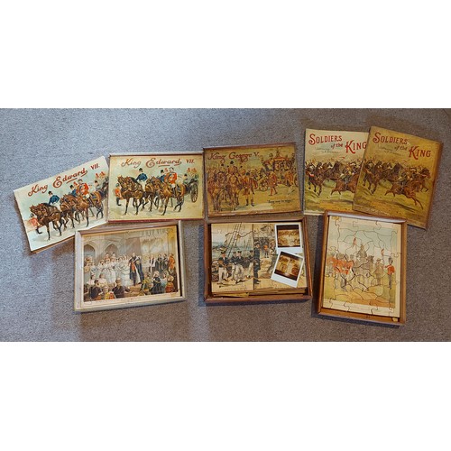 253 - Raphael Tuck and Sons King Edward VII Jigsaw puzzles together with two similar boxed puzzles, Soldie... 