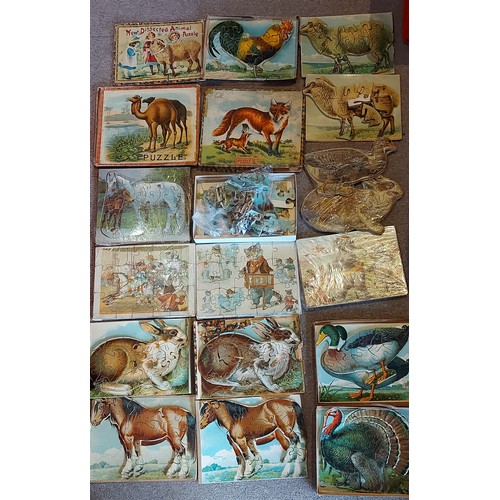261 - A collection of early wooden Jigsaw puzzles in the form of animals and others similar