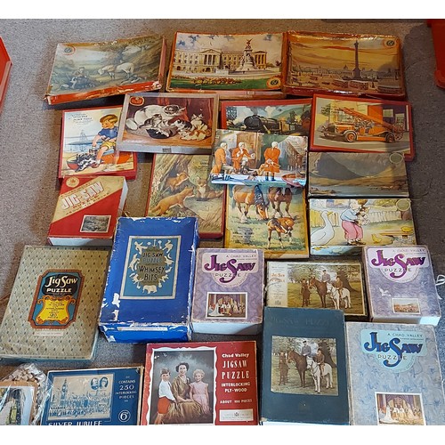271 - A collection of Jigsaw puzzles by Chad Valley to include The Silver Jubilee, Animal and Bird and oth... 